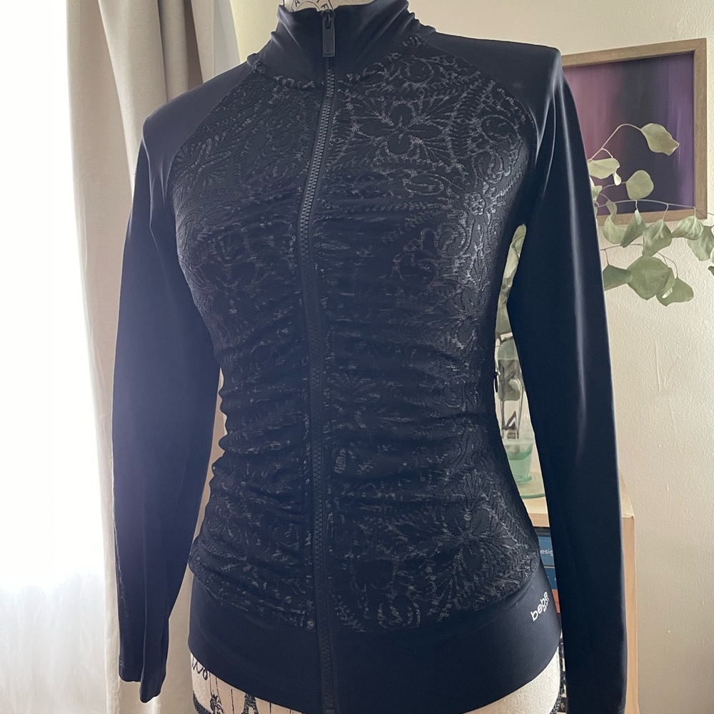 Bebe Black Lacey Ruffled Sports Long Sleeve with open Zipper Front Jacked